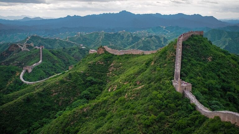 Kumbaya AI: Why Singing Digital Campfire Songs with China Won’t Work (Or: How I Learned to Stop Worrying and Love the AI Arms Race)